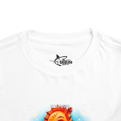 White kids birth month tshirt featuring a colorful seahorse design 