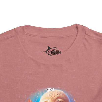 Kids birth month tshirt featuring a close-up of the collar and Sealife Spy logo