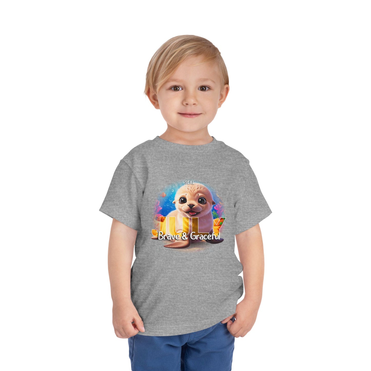 Toddler wearing grey kids birth month tshirt with cute puppy and Brave & Graceful design
