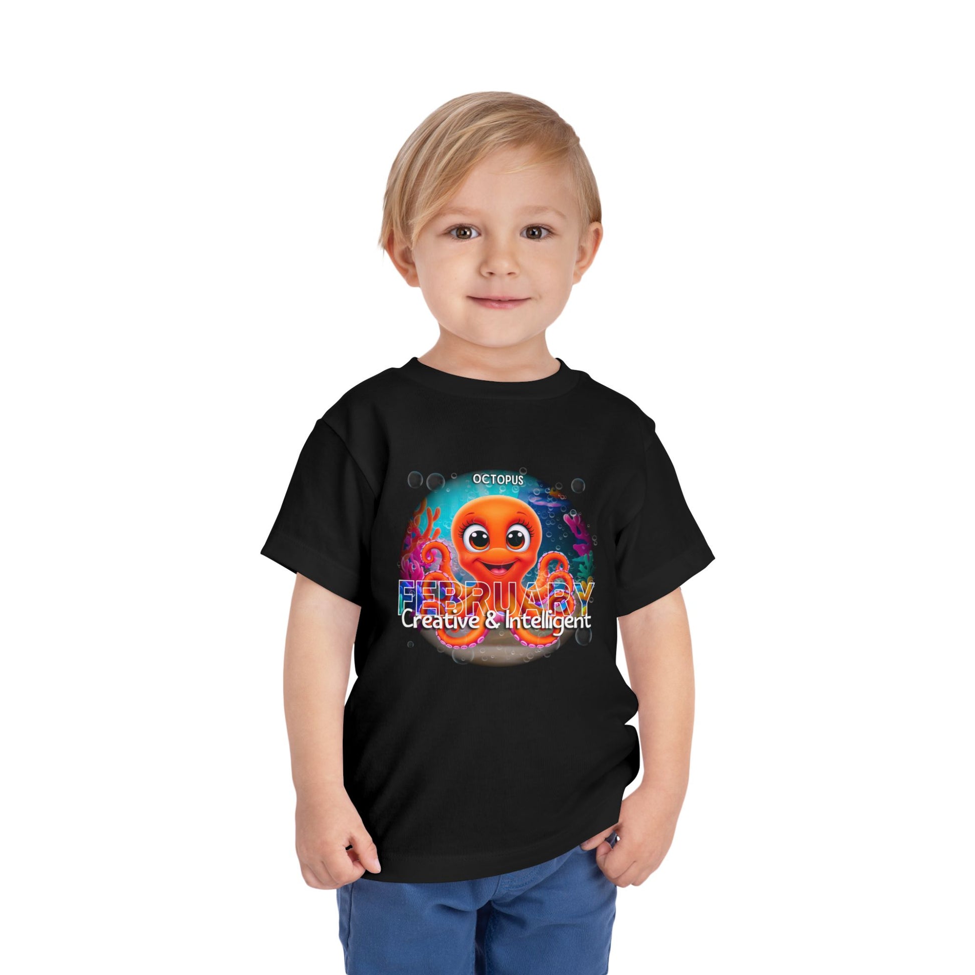 Child wearing a black kids birth month tshirt featuring a colorful octopus design for February