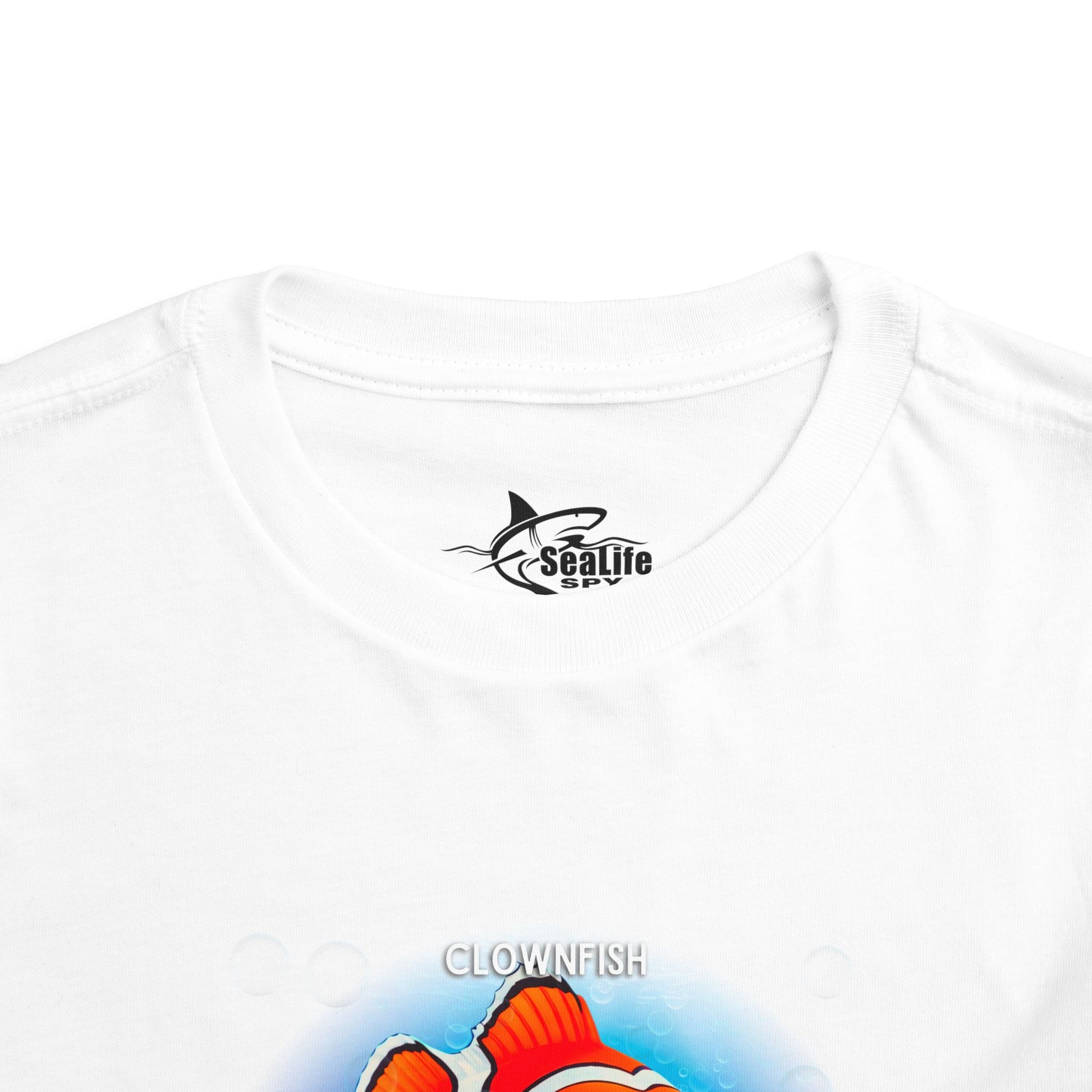 White kids birth month tshirt featuring a colorful clownfish graphic on soft fabric