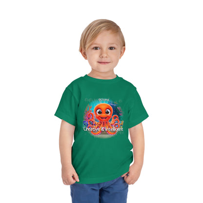 Young boy wearing green kids birth month tshirt with colorful octopus design and creative text