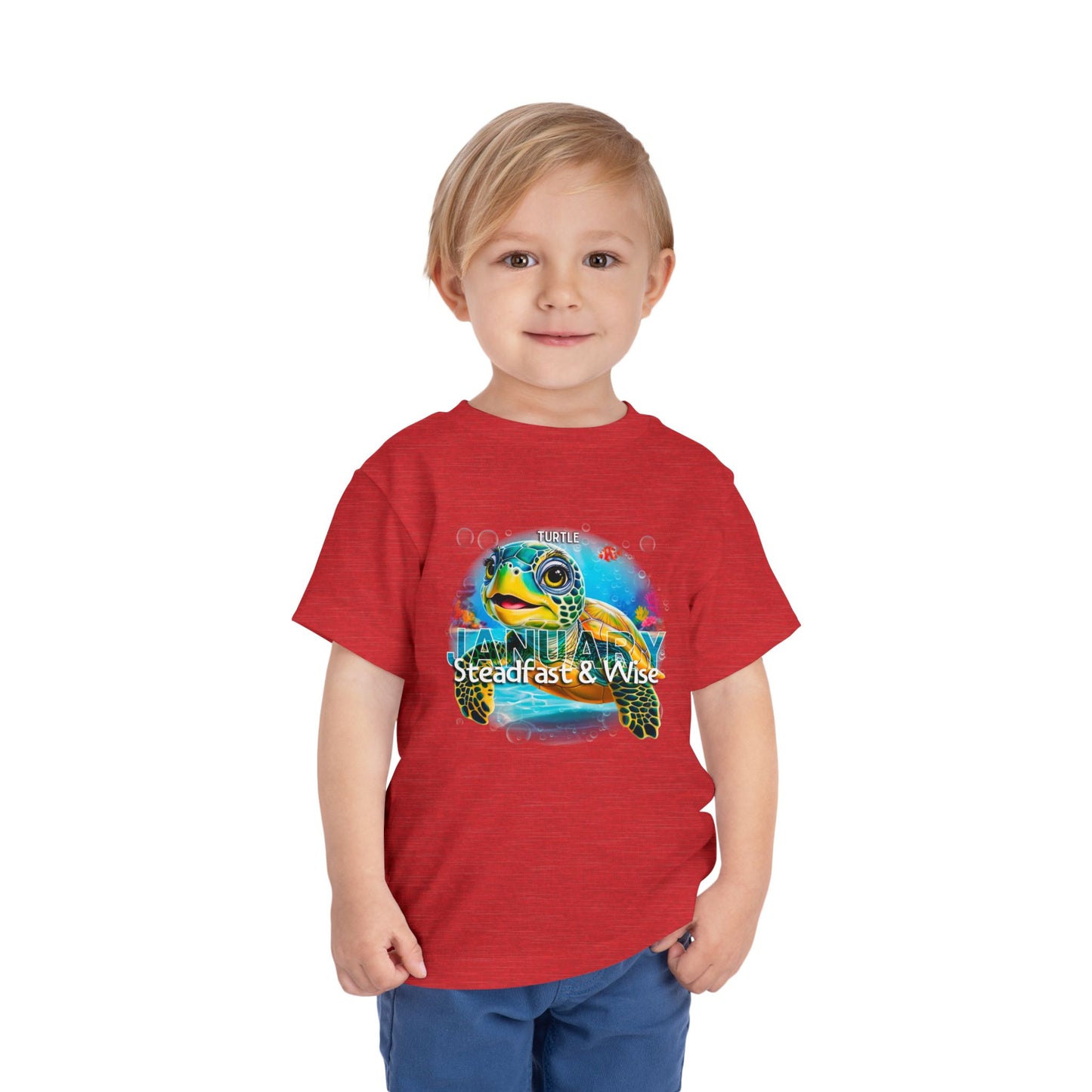 Child wearing a red kids birth month tshirt with a January sea turtle design 