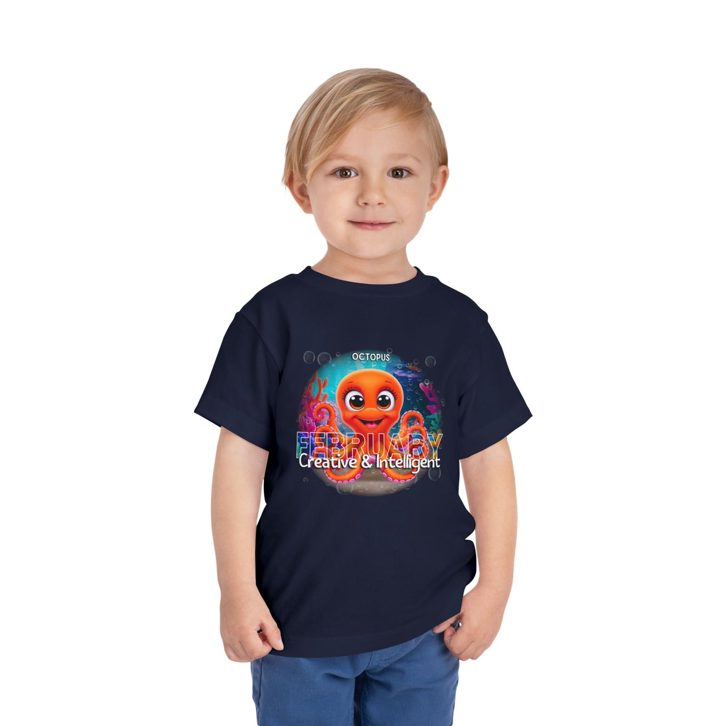Toddler wearing navy kids birth month tshirt featuring a colorful February octopus design