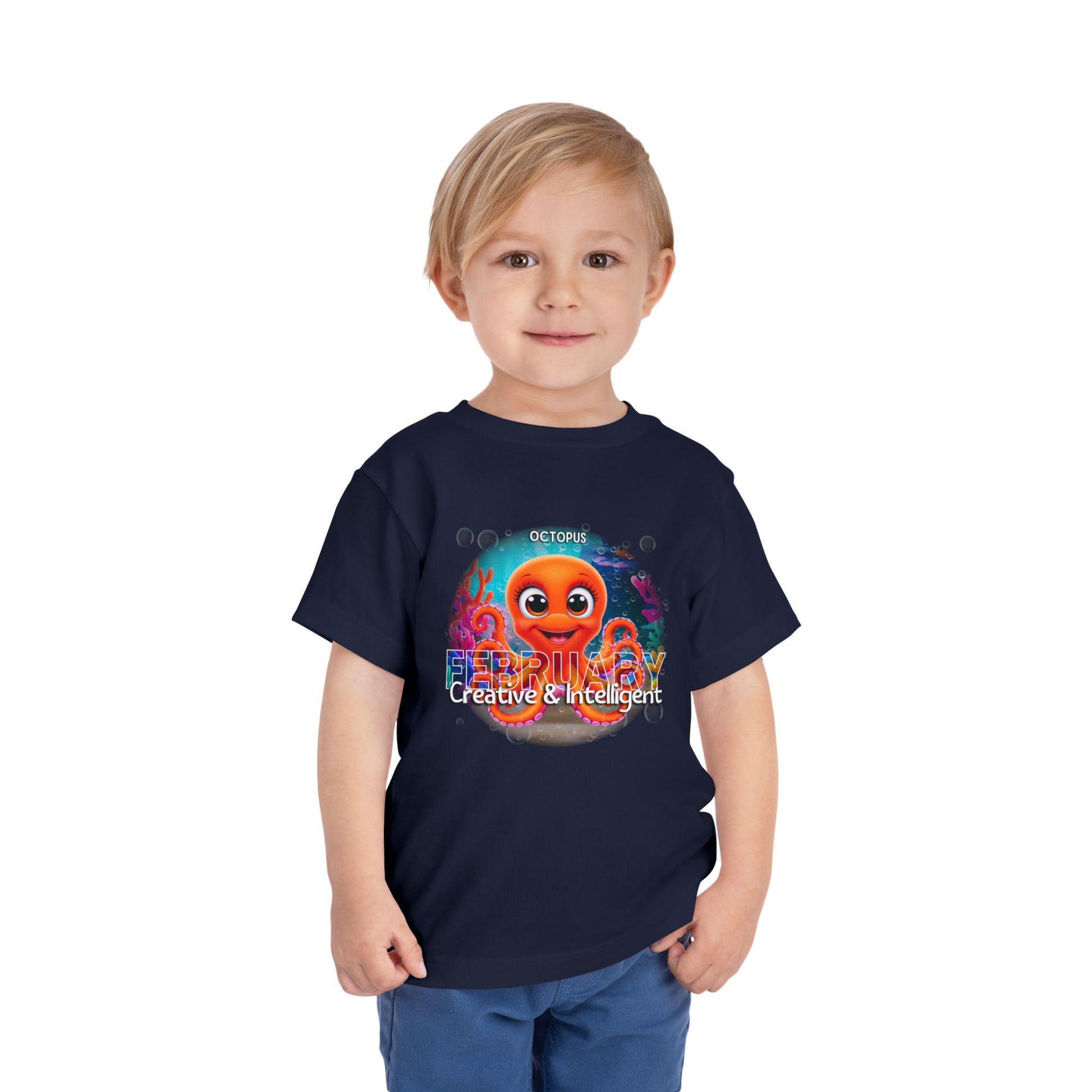 Toddler wearing navy kids birth month tshirt featuring a colorful February octopus design