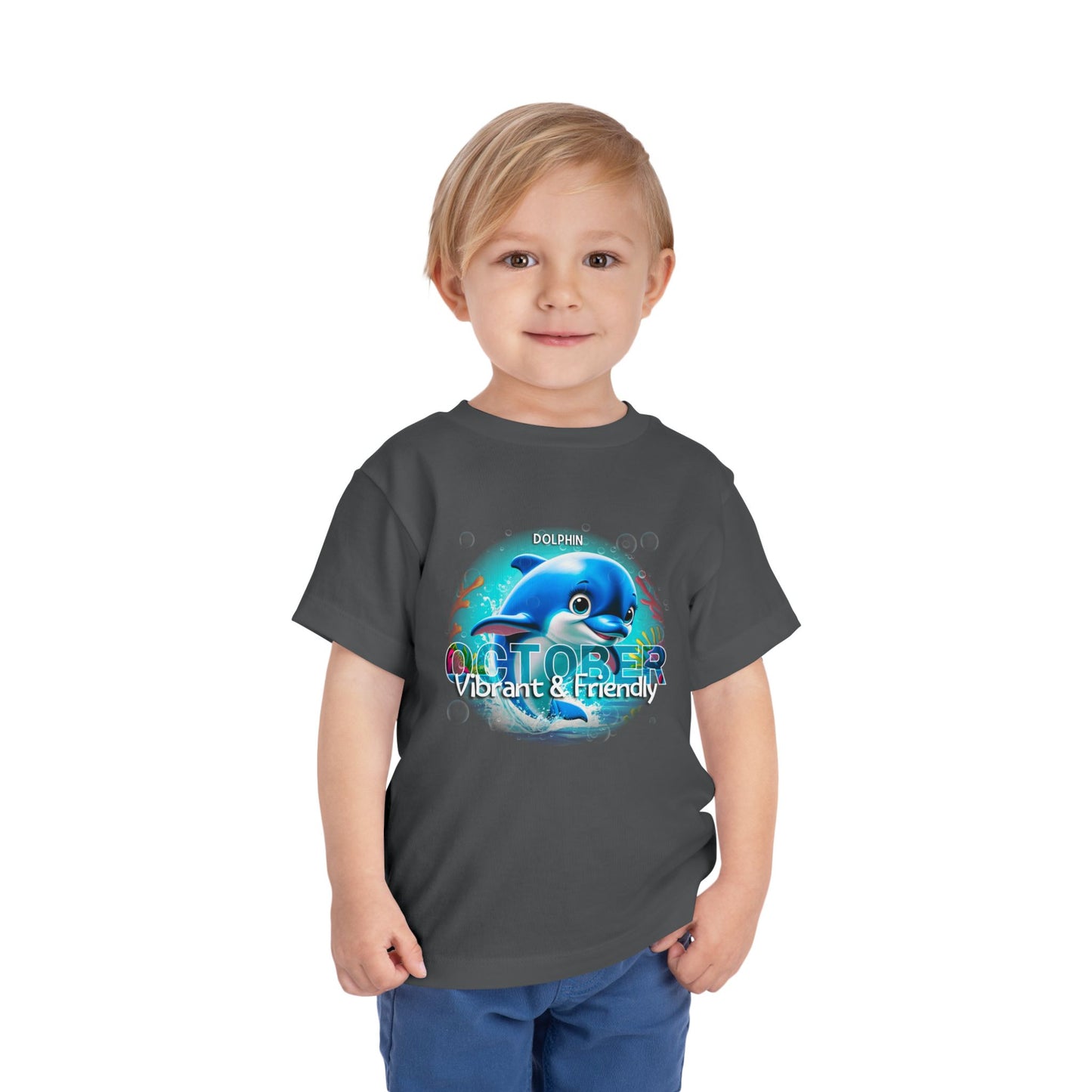 Child wearing kids birth month tshirt with October dolphin design vibrant and friendly