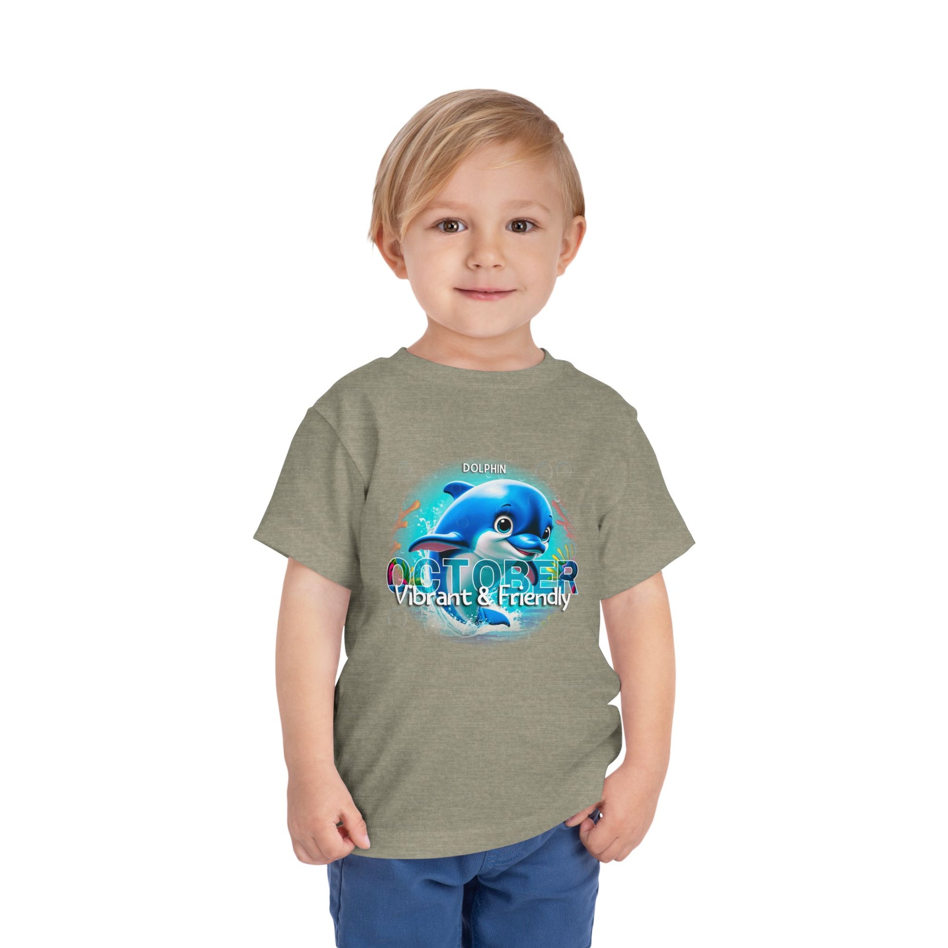 Child wearing kids birth month tshirt October with dolphin design vibrant and friendly