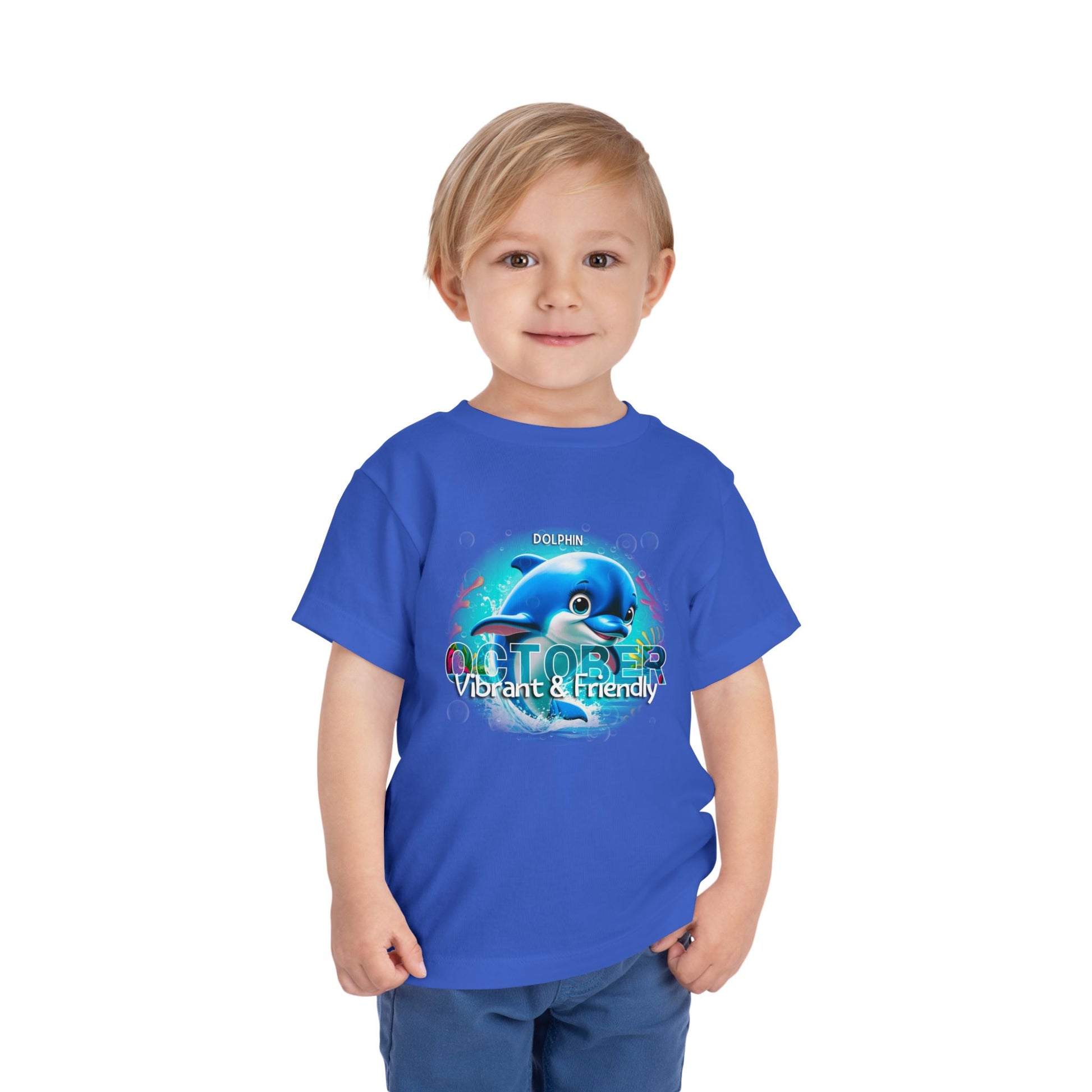 Kids birth month tshirt with blue dolphin design for October vibrant and friendly