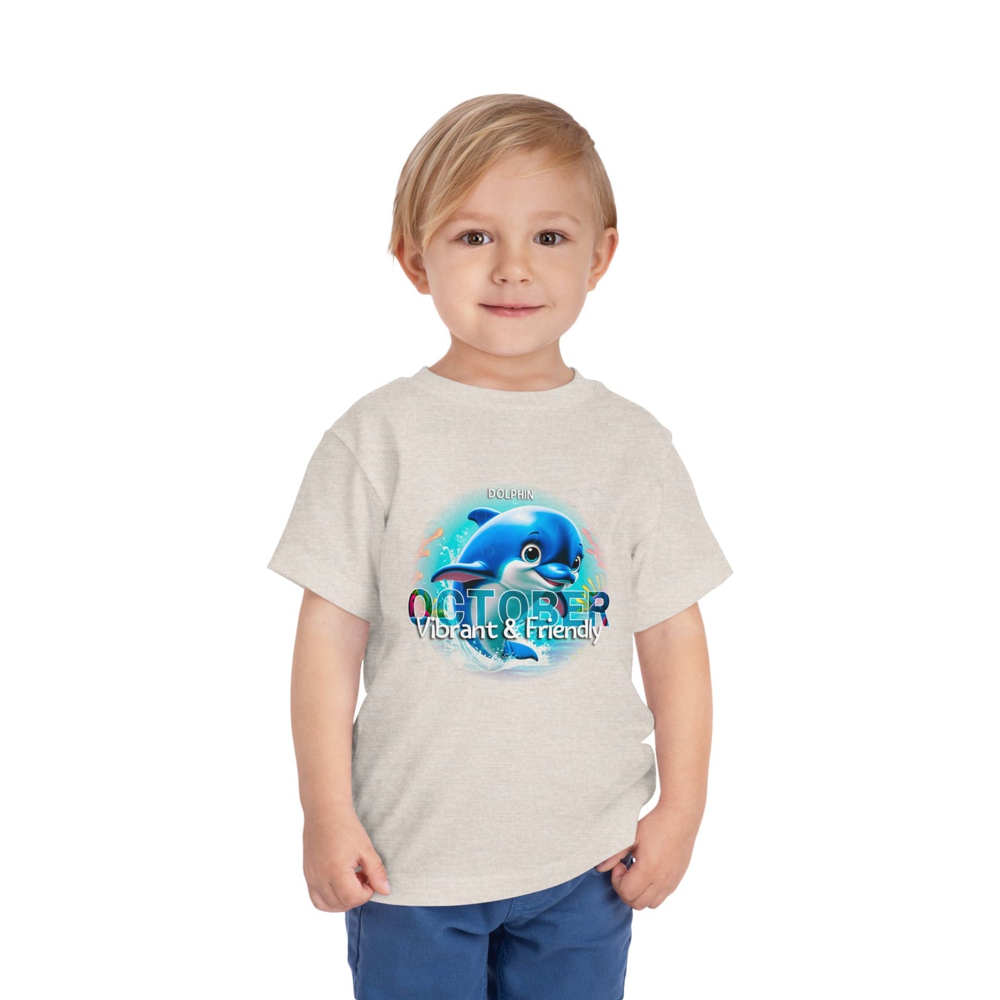 Toddler wearing a kids birth month tshirt with October dolphin design vibrant and friendly print