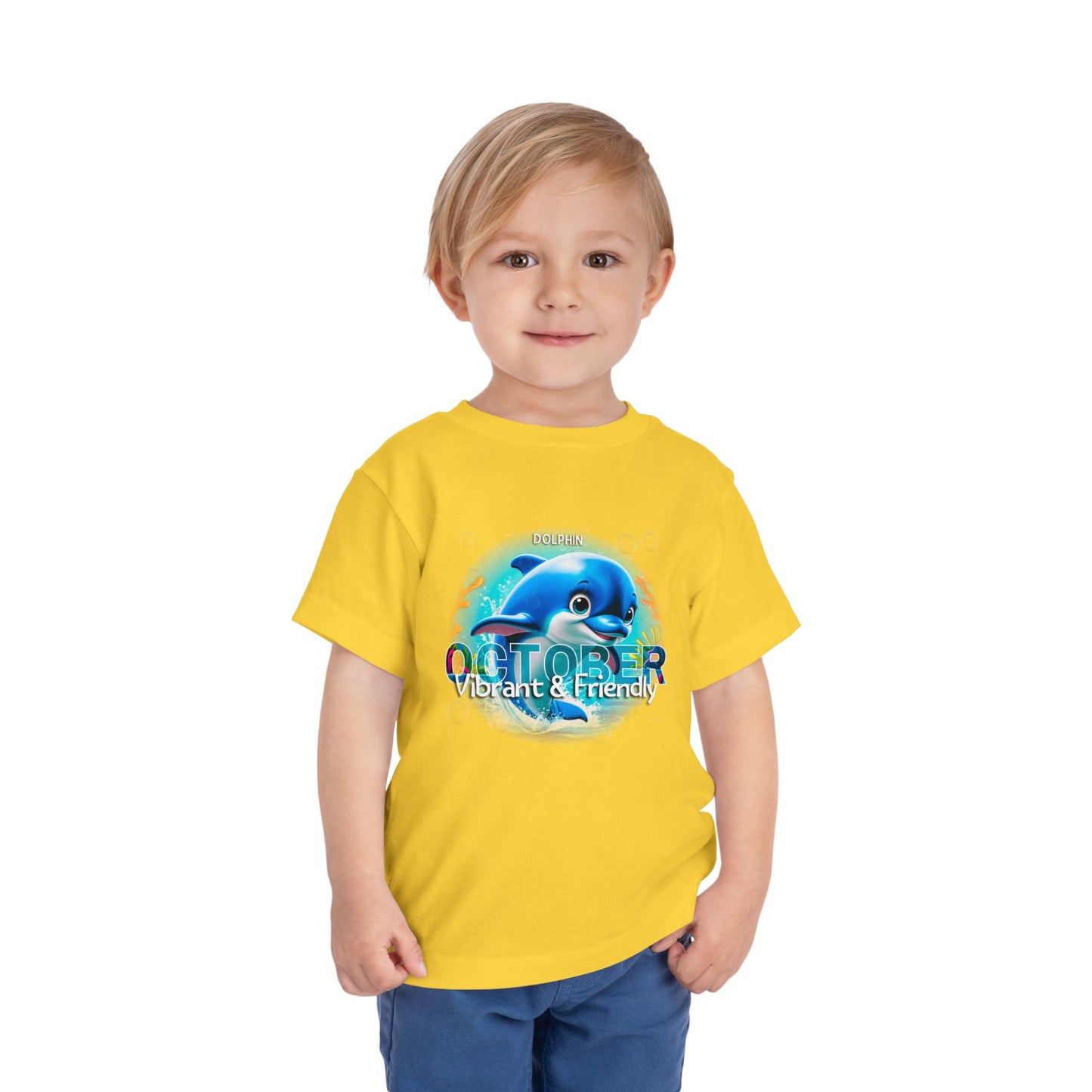 Kids birth month tshirt in yellow with dolphin October design on young boy