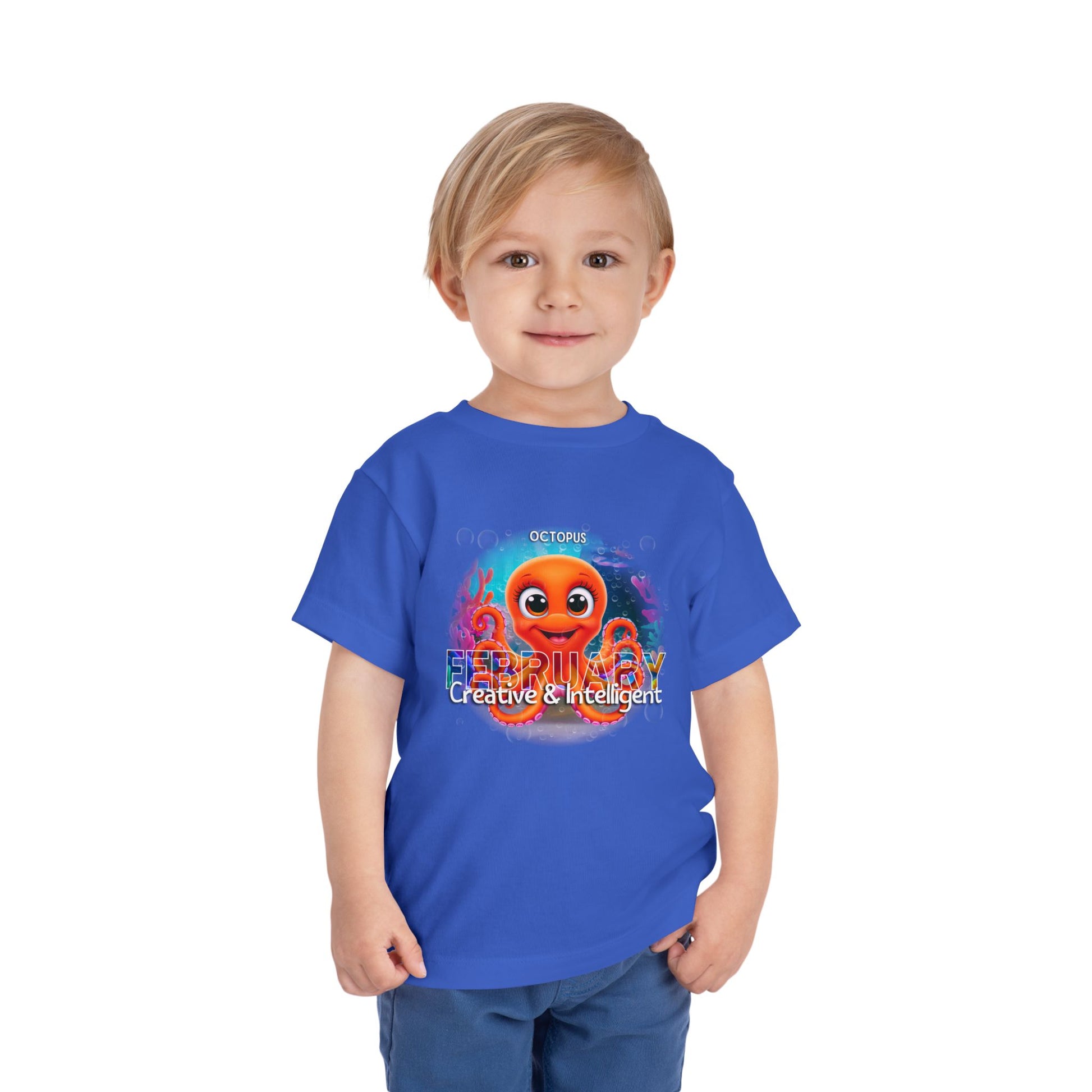 Toddler wearing a blue kids birth month tshirt with an octopus and February design 