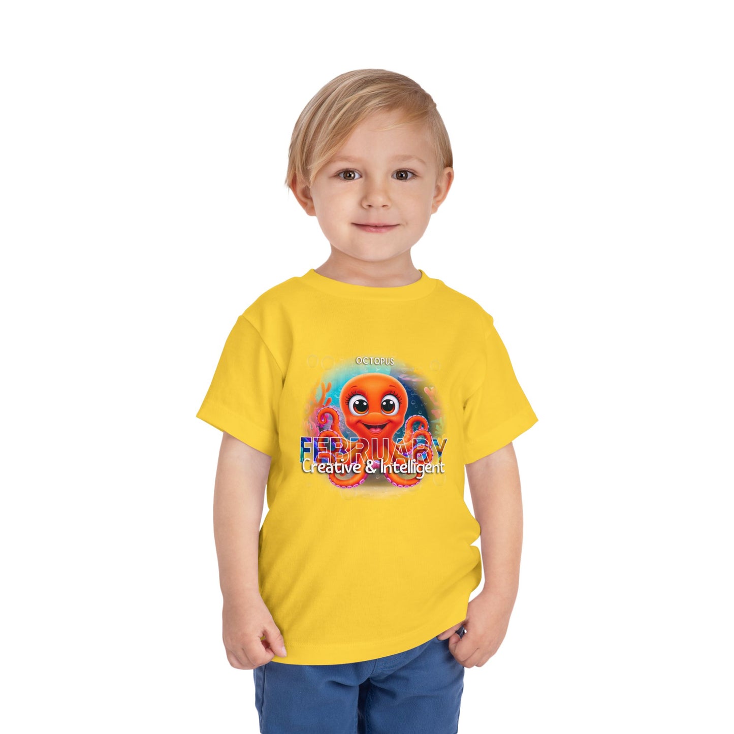 Child wearing a yellow kids birth month tshirt with a colorful octopus February design 