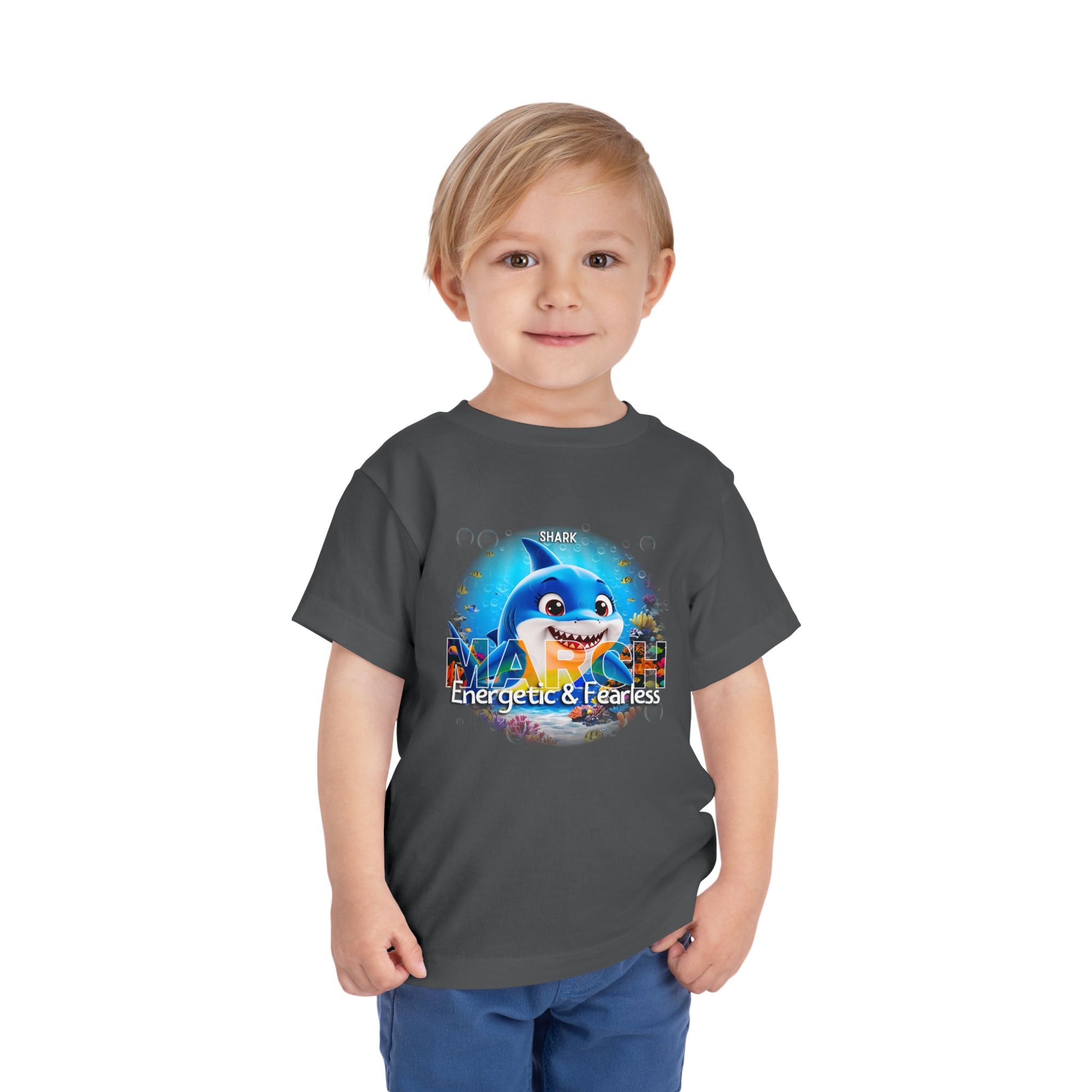 Kids birth month tshirt for March featuring a cartoon shark with energetic and fearless text