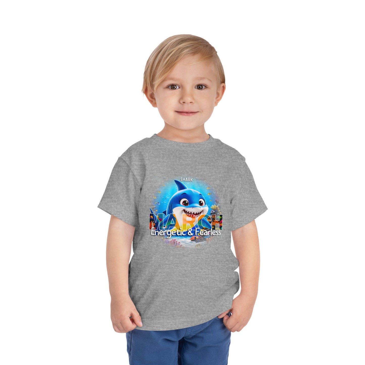 Toddler wearing gray kids birth month tshirt with March shark design energetic and fearless