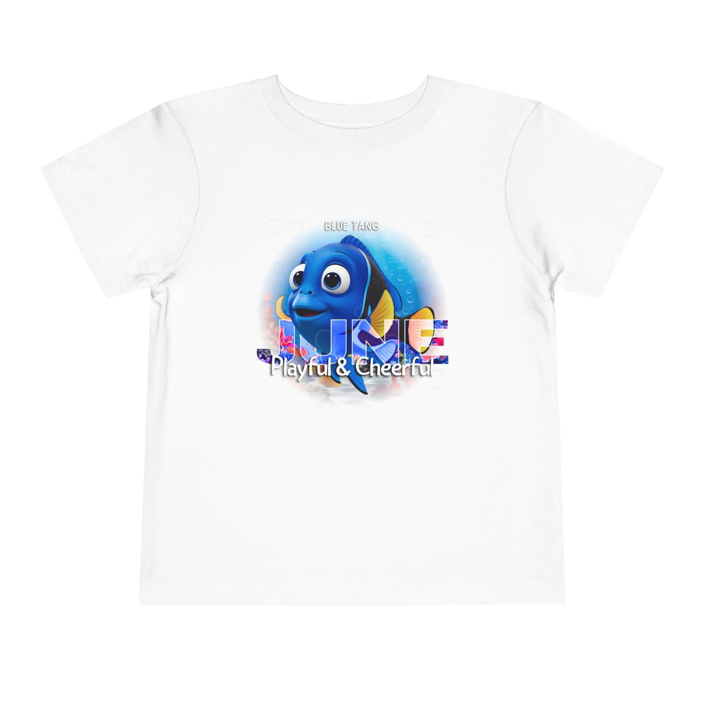 White kids birth month tshirt featuring playful blue tang fish graphic with playful and cheerful text