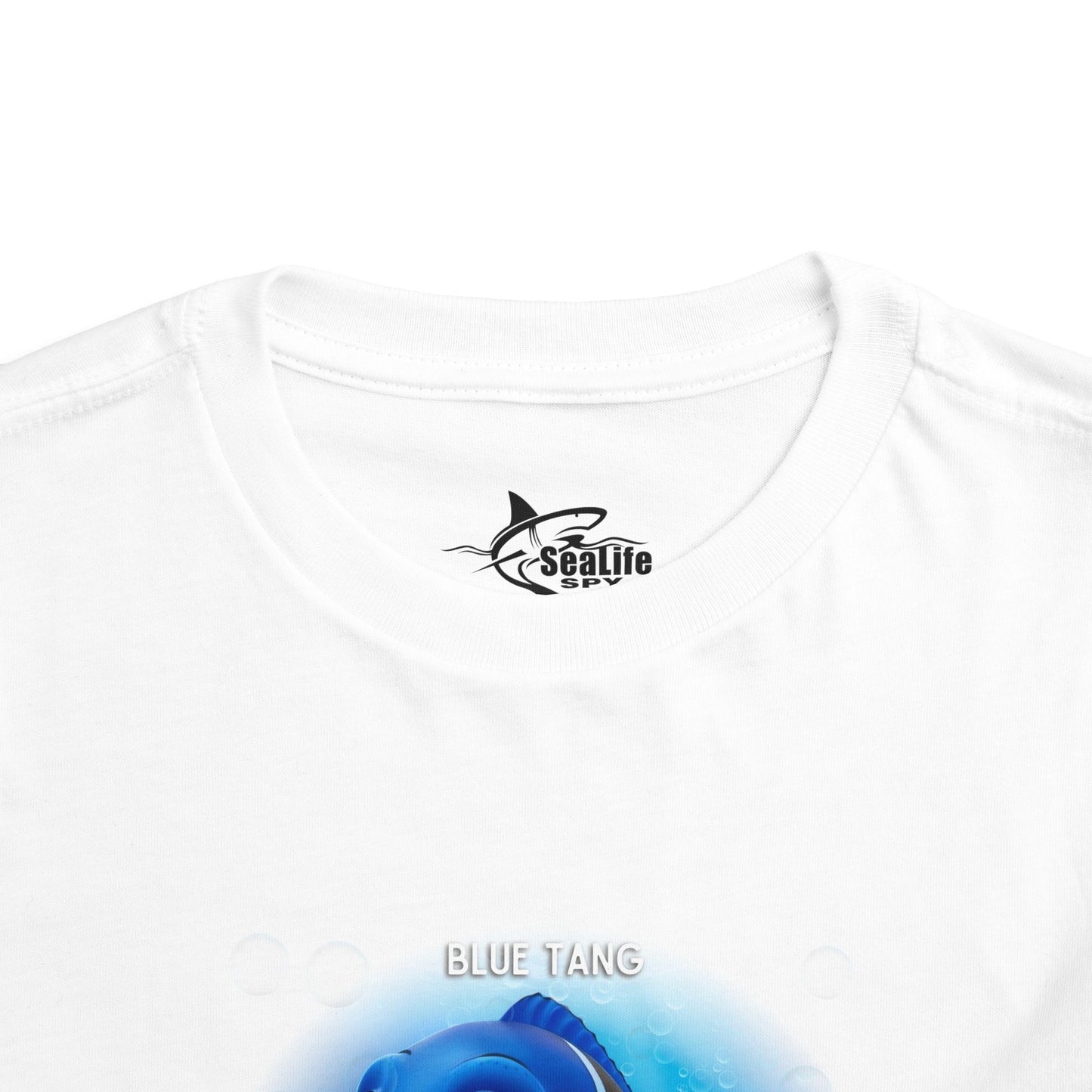White kids birth month tshirt featuring Blue Tang fish design for toddlers 