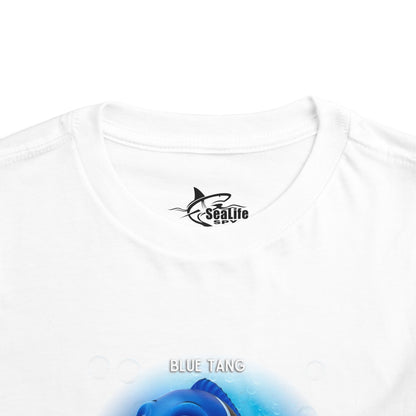 White kids birth month tshirt featuring Blue Tang fish design for toddlers 