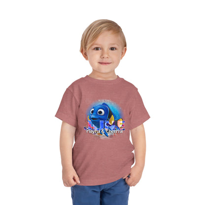 Toddler wearing a playful kids birth month tshirt with blue fish graphic and cheerful design
