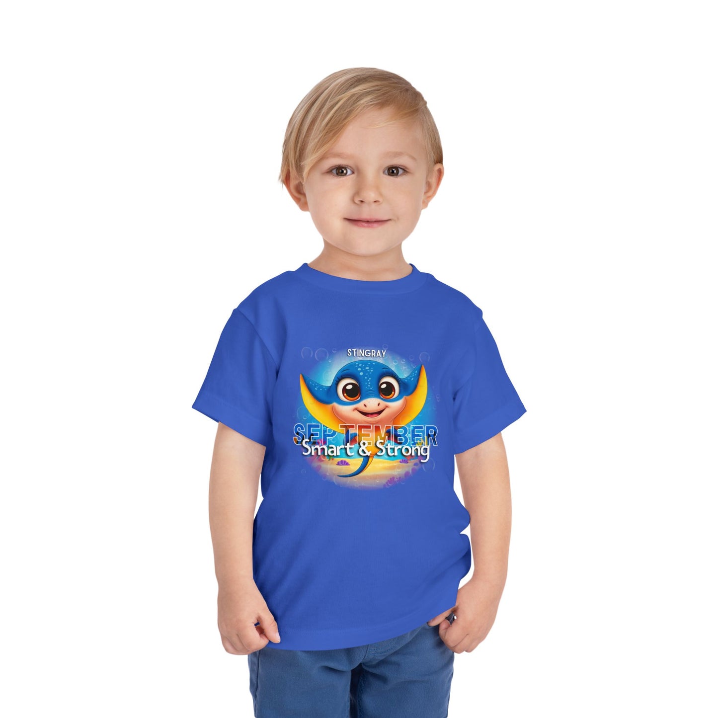 Toddler wearing blue kids birth month tshirt with cute stingray design for September
