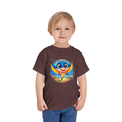 Toddler wearing a September kids birth month tshirt with colorful stingray graphic