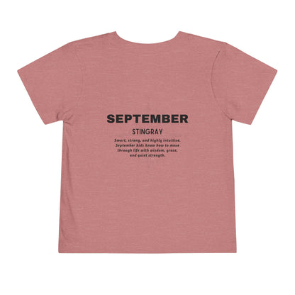 Kids birth month tshirt in pink with September text and inspirational message on back
