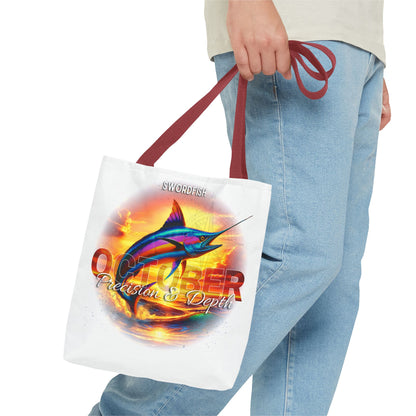 Birth month beach tote with colorful swordfish graphic and October design held by person